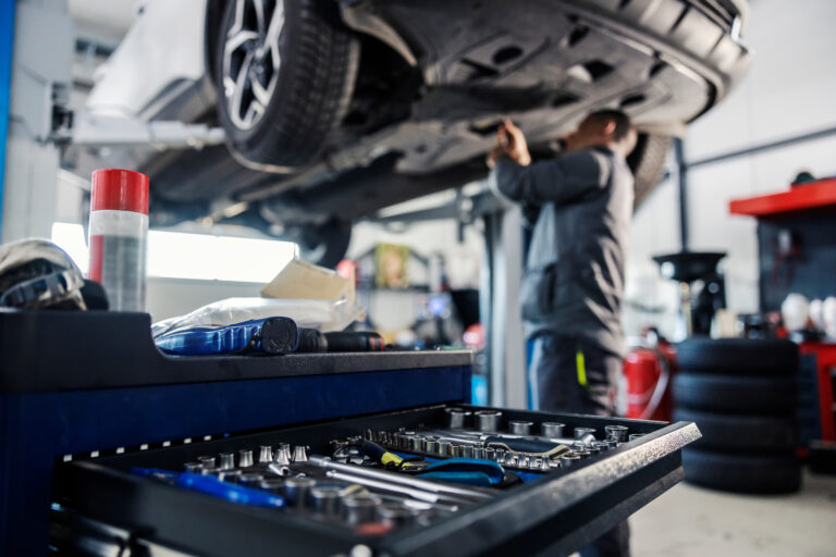 Employee working to prevent Claims for Auto Shop